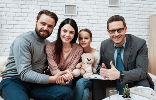 family with therapist in home